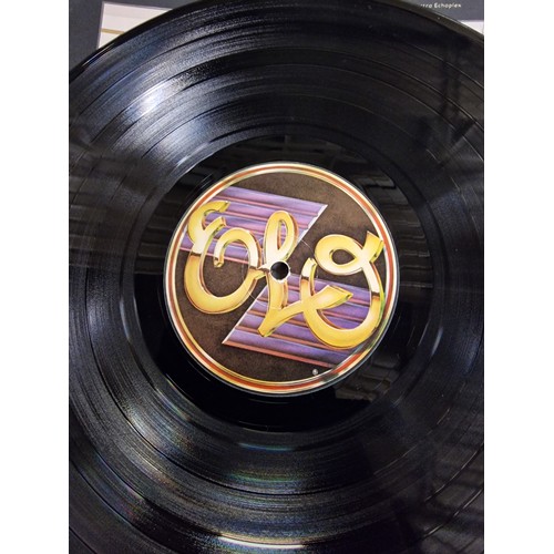 62 - 2 x ELO vinyl albums in good condition being A new world record & Discovery (with poster)