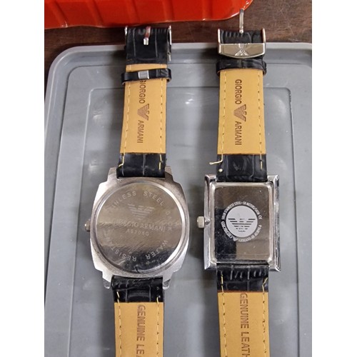 140 - 2 x gents designer style watches, both need batteries