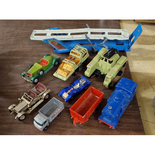 56 - Bundle of assorted die cast vehicles and trains including Matchbox and Corgi etc