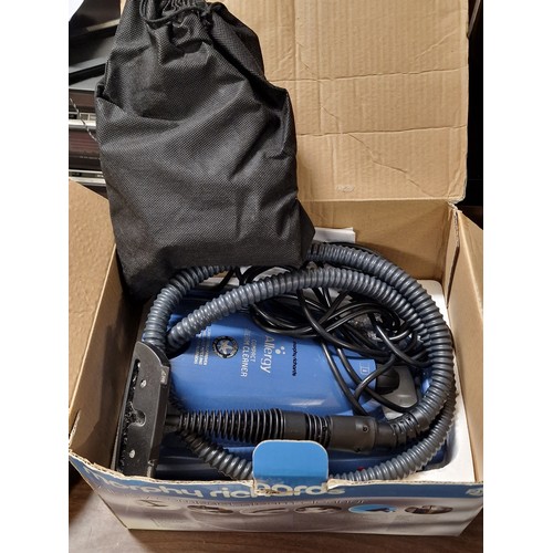 69 - Boxed Morphy Richards allergy compact steam cleaner