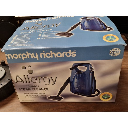 69 - Boxed Morphy Richards allergy compact steam cleaner