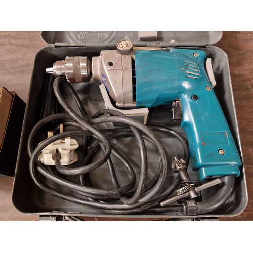 343 - Old working looks hardly used, Makita electric drill in case