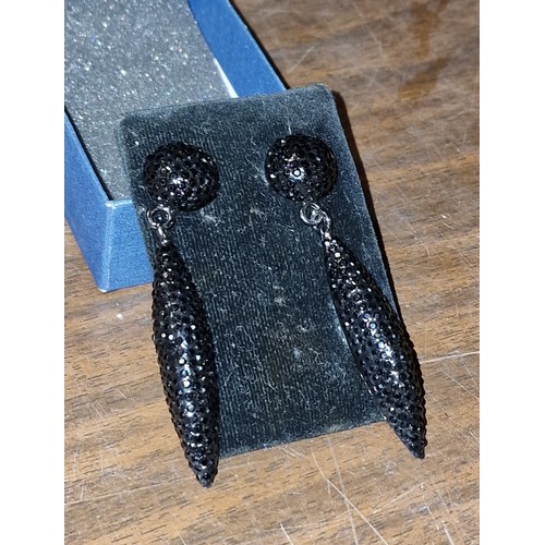 144 - As new Butler & Wilson black glitz earrings