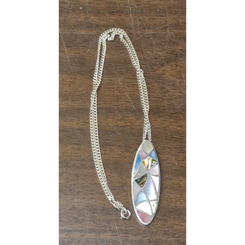 160 - 5 x 1.5 cm elongated oval mother of pearl silver pendant on 17