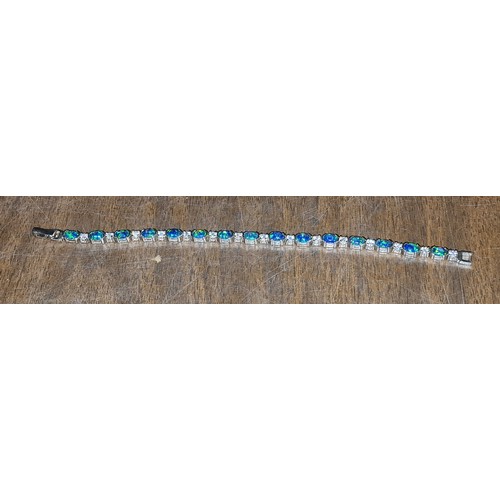 162 - 925 silver opal and cz tennis bracelet