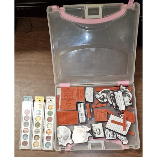 259 - 31.5 x 26 x 5 cm plastic storage case containing assorted card making stamps and metallic paint