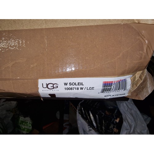 149 - Boxed and unworn, genuine Ugg Soleil boots size 4