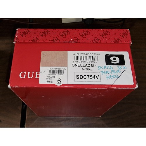 75 - Boxed and unworn Guess ladies designer shoes size 6