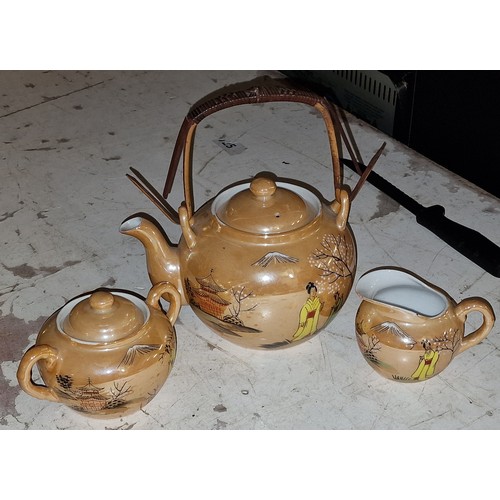 267 - Oriental porcelain teapot, milk jug and sugar bowl