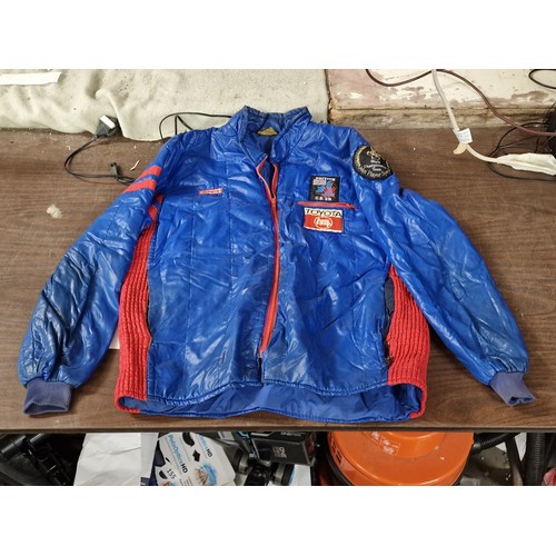 209 - Vintage bomber jacket with motor racing badges attached