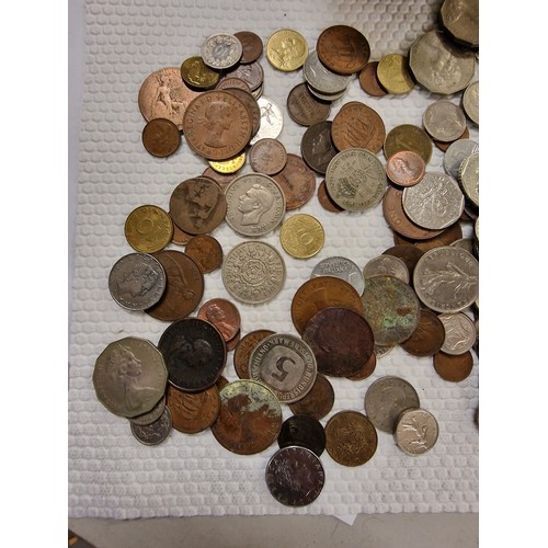 29 - Tin of assorted mixed silver and copper coinage