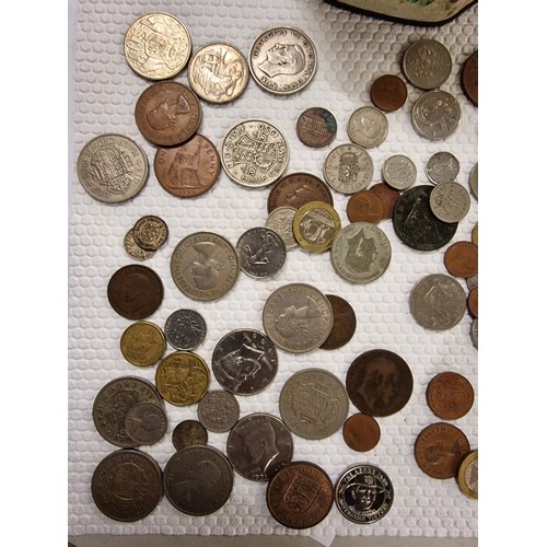 29 - Tin of assorted mixed silver and copper coinage