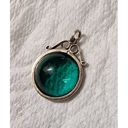 52 - 2 cm diameter unstamped white metal round pendant with green cabochon stone