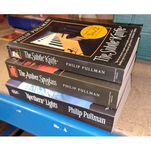 133 - 3 x Philip Pullman paperback books - Northern Lights/The Subtle Knife/The Amber Spyglass