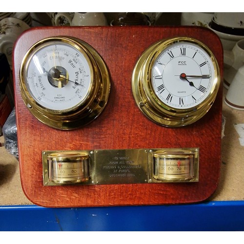 45 - 23.5 x 20 cm mounted barometer/clock/hygrometer/thermometer with presentation plaque