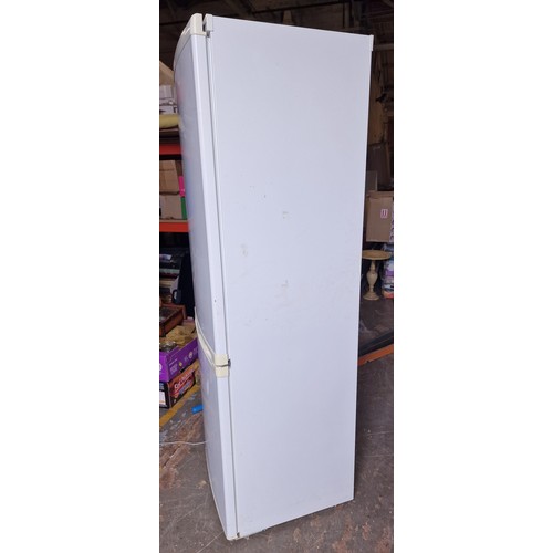 292 - 60 cm wide and 185 cm tall white Logik 60/40 fridge freezer