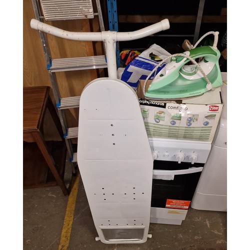 297 - Ironing board and boxed Morphy Richards comfigrip iron