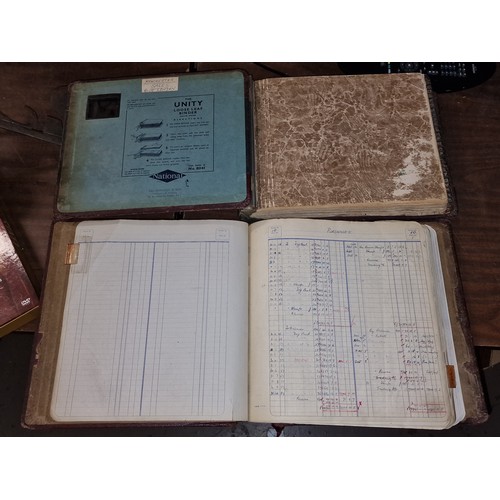 130 - 2 x mid-century hardback accounting ledgers with written detail inside