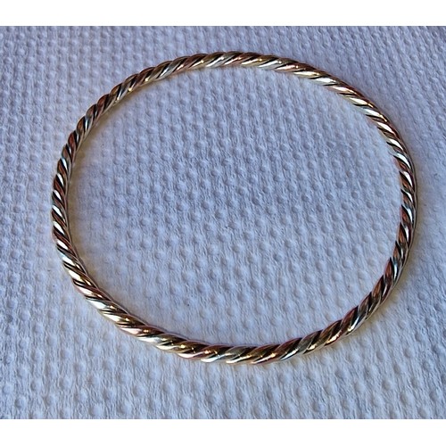 324 - Hallmarked 9 ct gold tri colour bangle - 14.8 gm