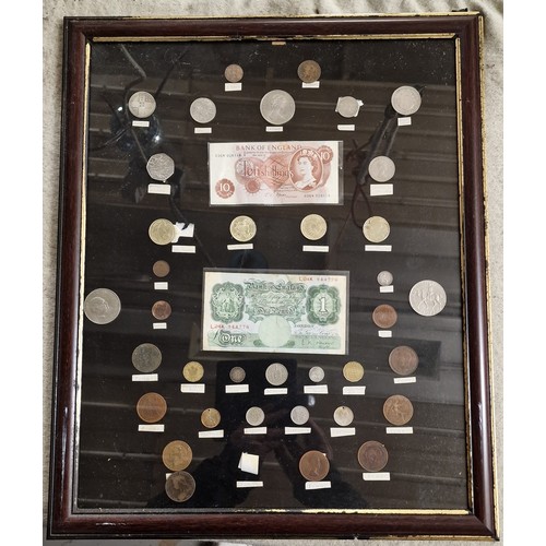 33 - 46 x 56 cm framed display of assorted UK coins and notes