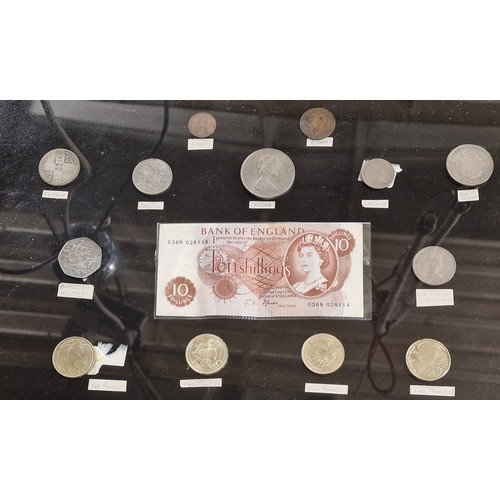 33 - 46 x 56 cm framed display of assorted UK coins and notes