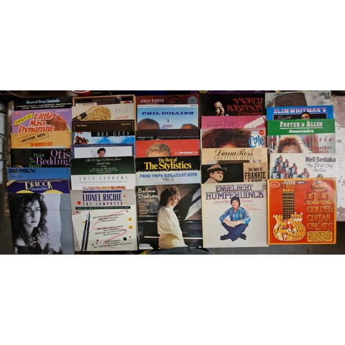 218 - Large eclectic job lot of assorted vinyl albums, including 6 x Elvis, in varying conditions