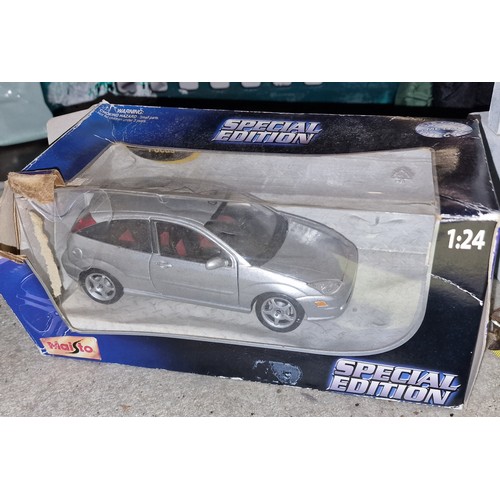 156 - Maisto 1/24 special edition Ford SVT Focus in slightly distressed box