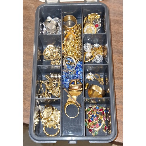 42 - Small plastic box of assorted mostly gold tone jewellery etc