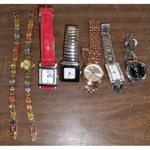 48 - Gold tone watch and matching bracelet & other assorted jewelled ladies watches