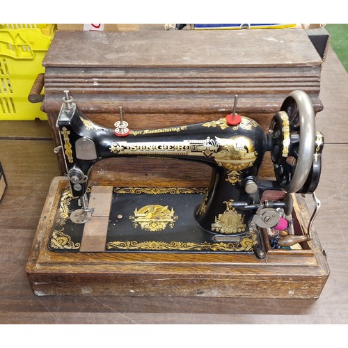 287 - Edwardian Singer 27K manual sewing machine in wooden case - turns freely