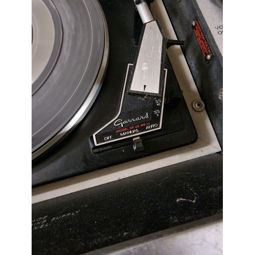 148 - Bush transistorised record player (Garrard SP 25 mk III), working but stylus doesn't grip on grooves... 