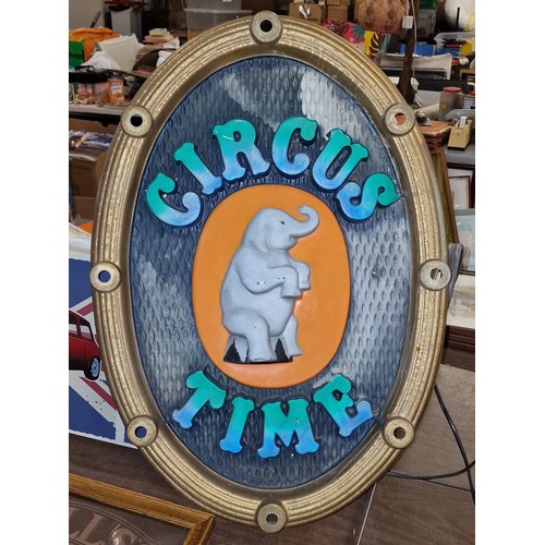 80 - 69 x 48.5 cm oval plastic 'Circus Time' sign with split on top