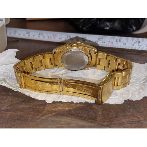 71 - gents oyster perpetual designer style watch with gold face