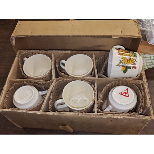 224 - Retro boxed and unused 6 place setting, 18 piece Romanian pottery tea set with floral pattern