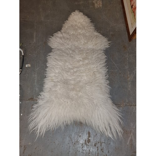 76 - Approx 4 ft x 2 ft genuine lambskin rug