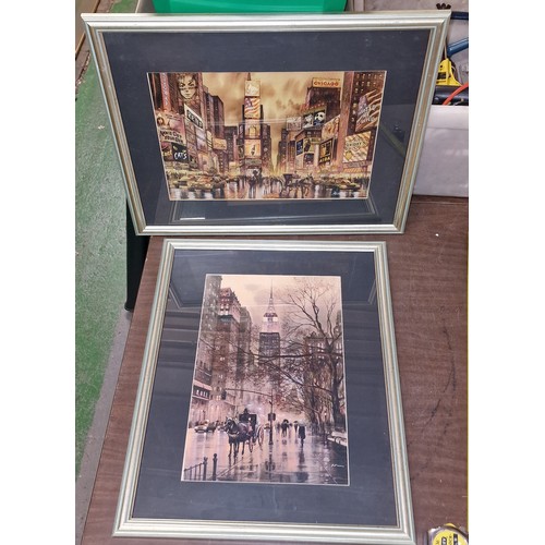 304 - Pair of 45 x 55 cm framed and mounted New York scene prints after original paintings