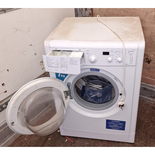 123 - 60 cm wide white Indesit 7 kg washing machine model IWD71250