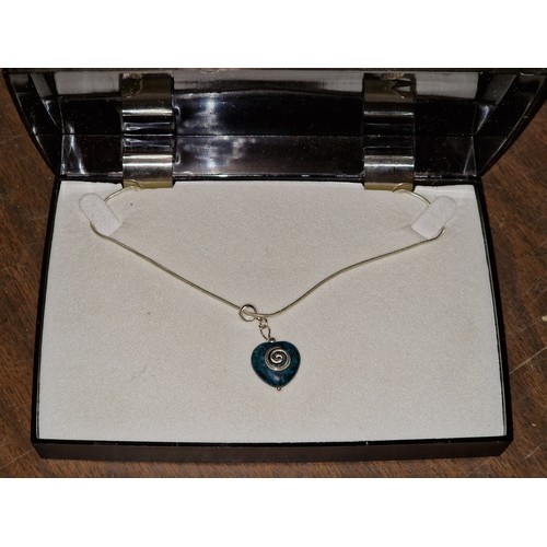 303 - 925 silver chain with heart shaped pendant with blue jewel