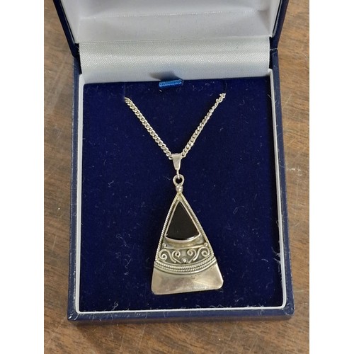 304 - 925 silver chain with triangular and onyx pendant