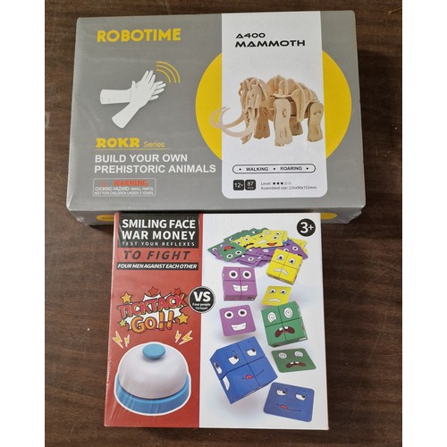 71 - New and sealed Robotime Mammoth kit & Smiling Faces game