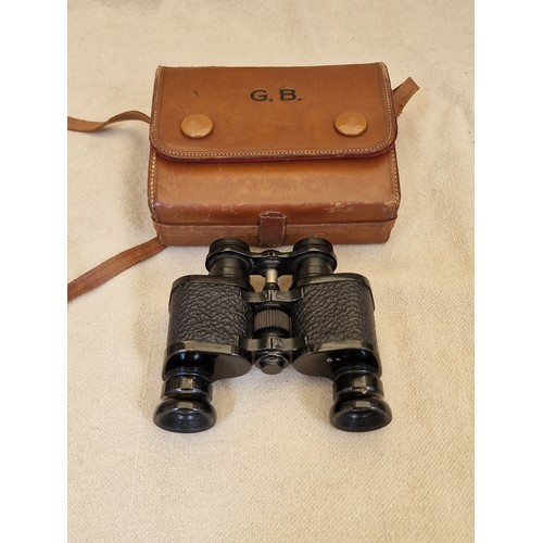 209 - Pair of vintage 6 x binoculars in monogrammed leather case