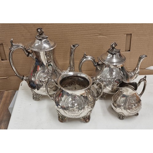 104 - Silver plated old tea service with ornate raised patterning