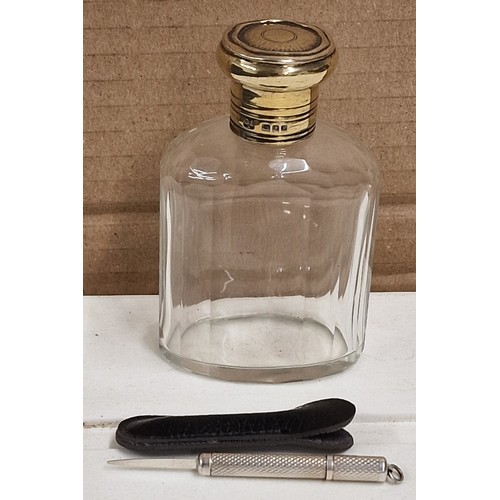 3 - Hallmarked silver lidded, London 1930, cologne bottle and London silver retracting tooth pick