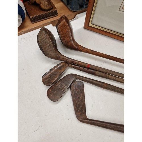 37 - Small bundle of very old golf clubs and 82.5 x 62.5 cm framed and mounted vintage print after origin... 