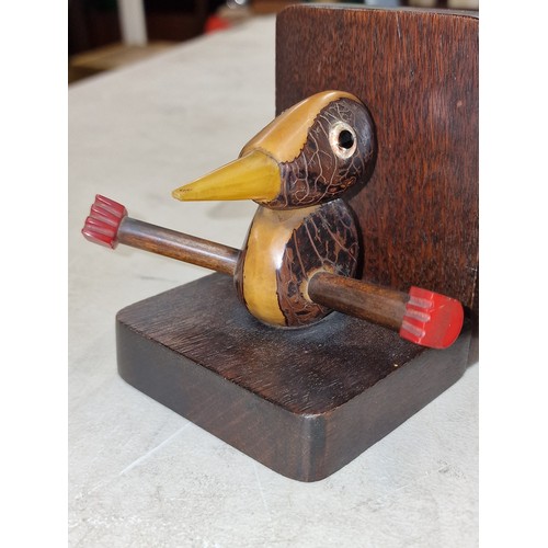 209 - Pair of Henry Howell style YZ bird bookends with amber bakelite beaks and cherry amber feet