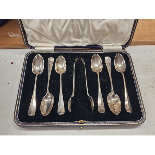 256 - 1910 Martin Hall & Co hallmarked silver initialled teaspoon and sugar nip set in case