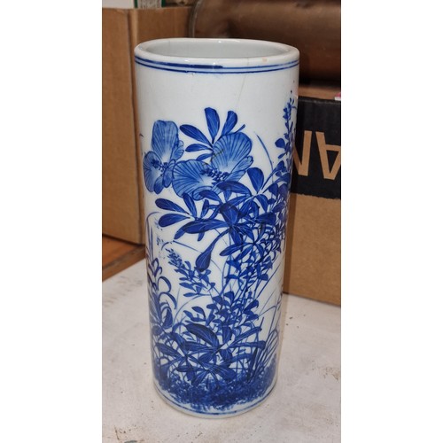 232 - 24.5 cm tall blue and white patterned Chinese sleeve vase, couple of hairline cracks