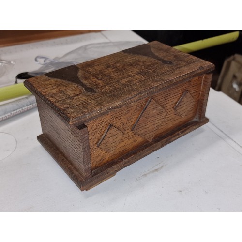 76 - Wooden chest shaped trinket box with assorted religious pendants, rosaries, crosses etc