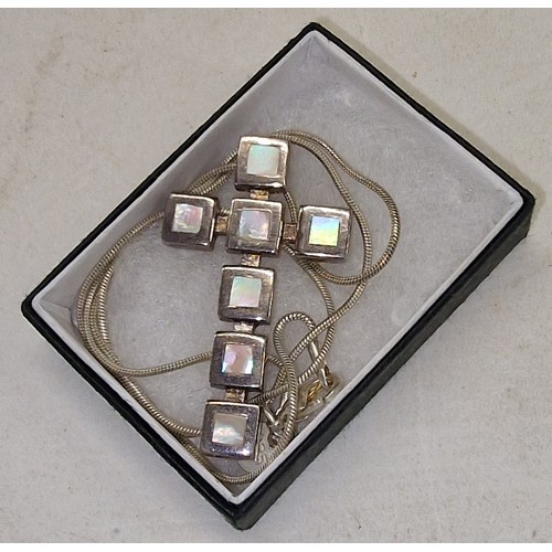 347 - 4.5 x 2.5 cm 925 mounted mother of pearl cross pendant on chain