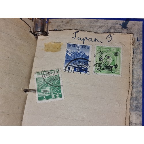 3 - Small pocket book with assorted vintage stamps